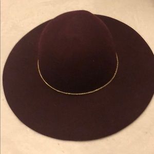 Maroon felt hat with gold braided detailing